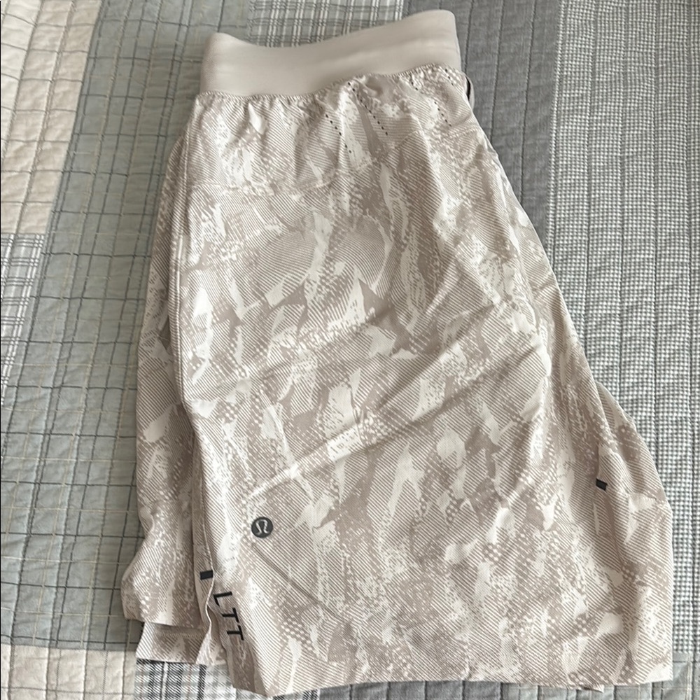 Men’s medium Lululemon licensed to train shorts. Lined with 7 in inseam.